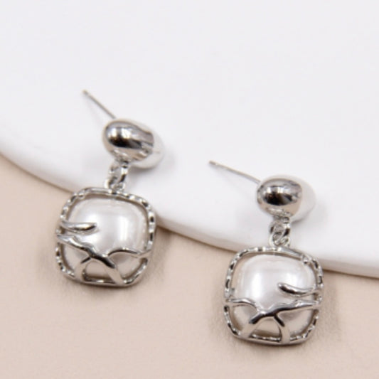 Boucles d'oreilles pendantes Perle